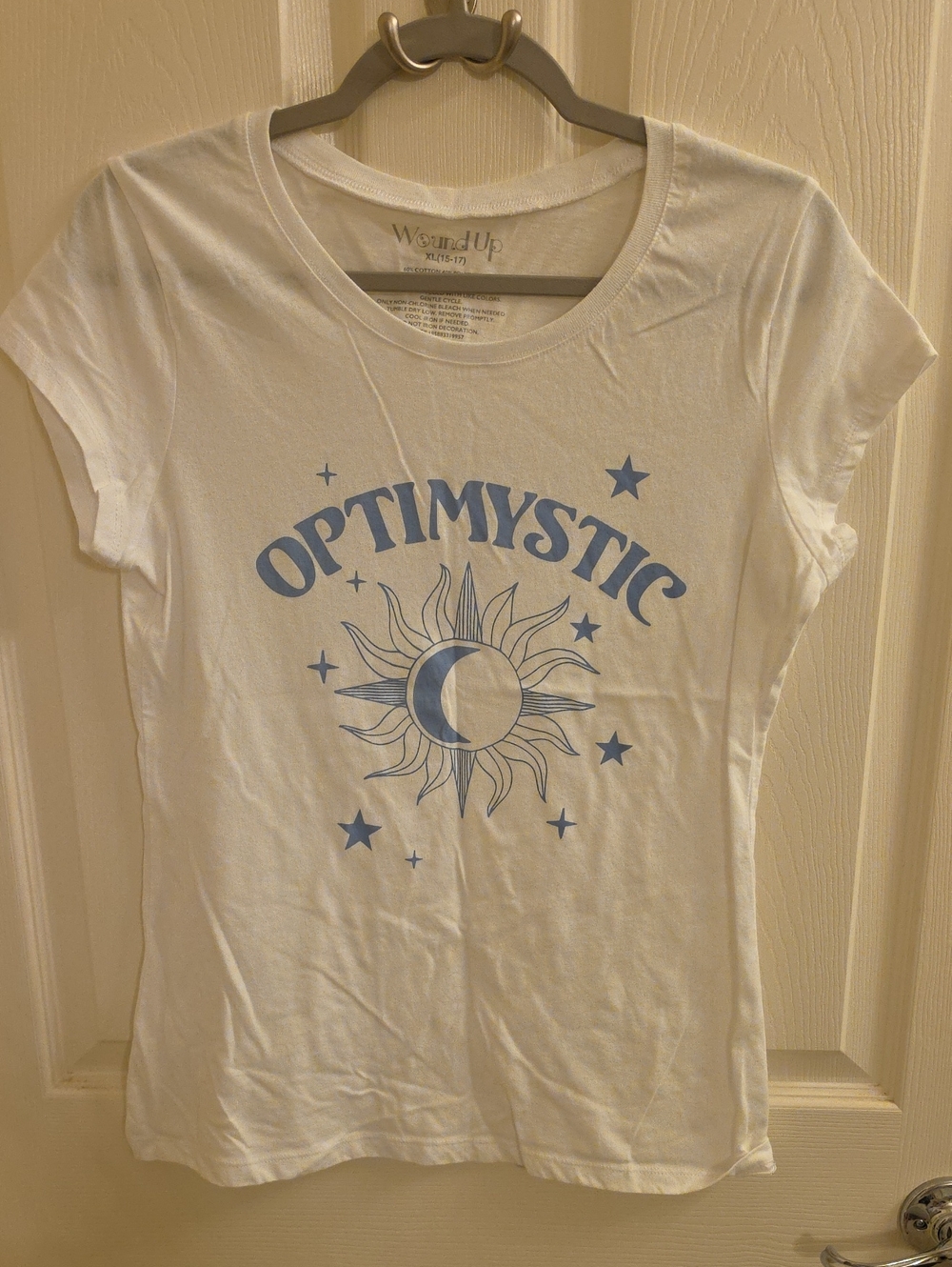 Wound Up White Short Sleeve Tee with Light Blue 'OPTIMYSTIC' Sun & Moon Graphic
